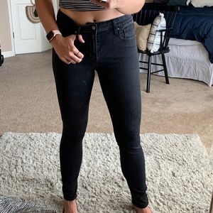 Faded black high rise skinny Levi’s